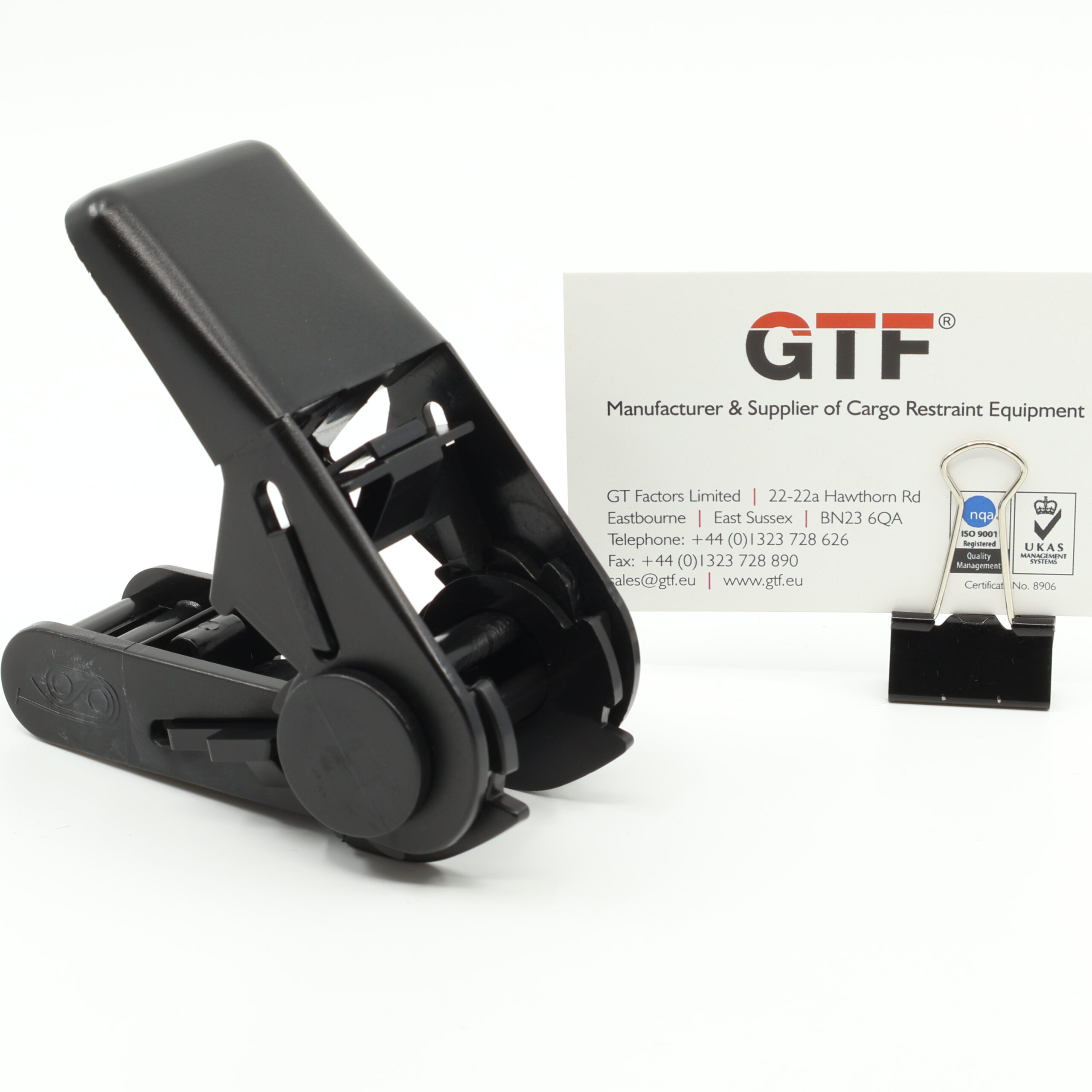 25Mm Black Plastic Ratchet Buckle | 200Kg - With Business Card For Scale